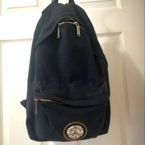 Versace versus backpack